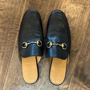 Gucci Black Leather Mules with Gold Bit Detail